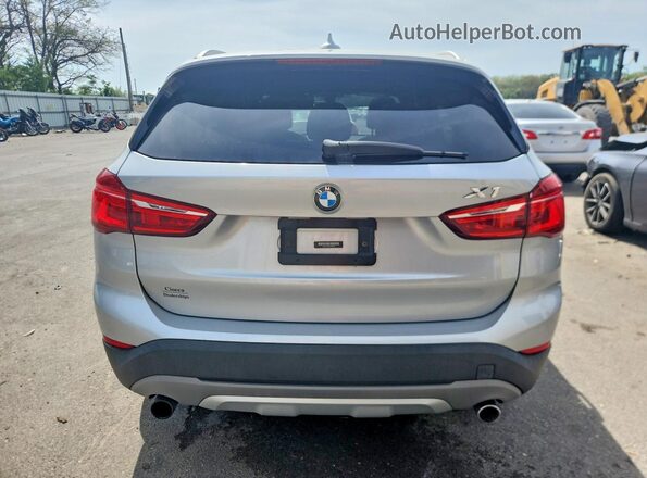 WBXHT3C39GP887460 2016 BMW X1 Серебряный Вид сзади