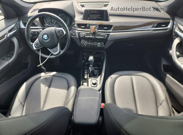 WBXHT3C39GP887460 2016 BMW X1 Серебряный Вид панели приборов