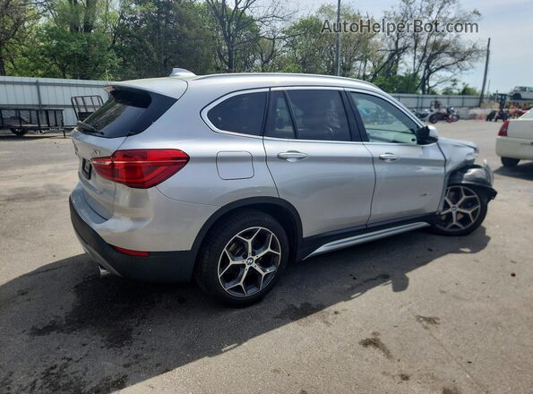 WBXHT3C39GP887460 2016 BMW X1 Серебряный Задняя правая четверть