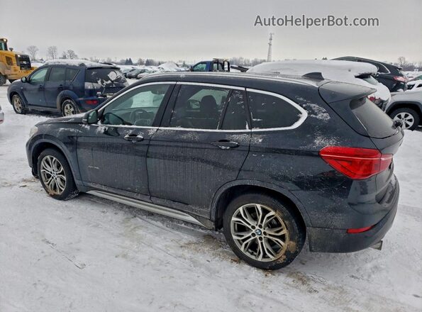 WBXHT3C39GP887927 2016 BMW X1 Black Trasero izquierdo