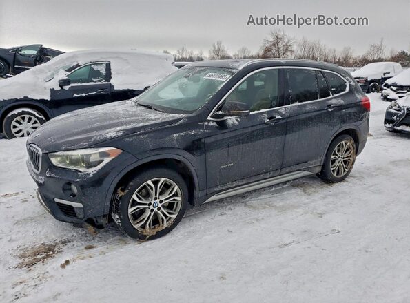 WBXHT3C39GP887927 2016 BMW X1 Black Vista tres cuartos delantera izquierda