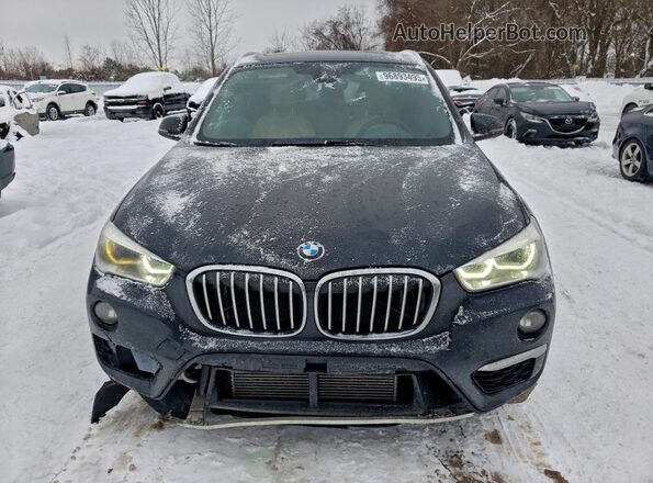 WBXHT3C39GP887927 2016 BMW X1 Black Vista frontal