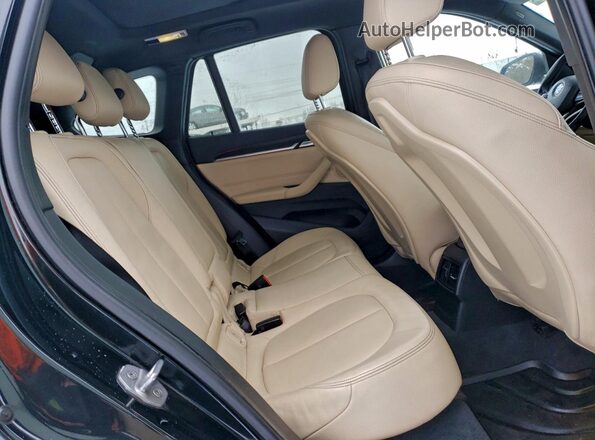 WBXHT3C39GP887927 2016 BMW X1 Black Vista interior trasera