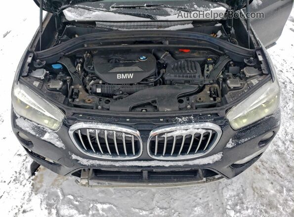 WBXHT3C39GP887927 2016 BMW X1 Black Vista del compartimento del motor