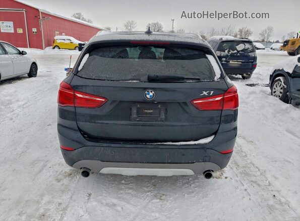 WBXHT3C39GP887927 2016 BMW X1 Black Vista trasera