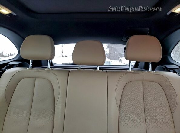 WBXHT3C39GP887927 2016 BMW X1 Black Vista de los asientos traseros