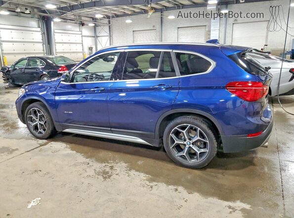 WBXHT3C39J5K29558 2018 BMW X1 Blue Trasero izquierdo