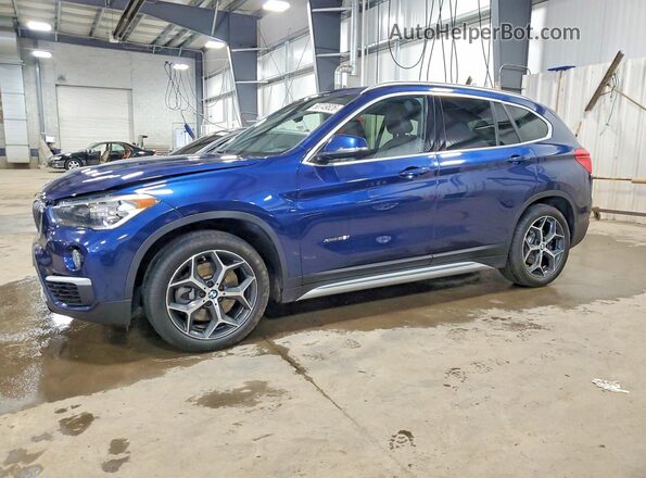WBXHT3C39J5K29558 2018 BMW X1 Blue Vista tres cuartos delantera izquierda