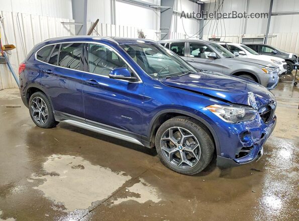 WBXHT3C39J5K29558 2018 BMW X1 Blue Delantero derecho