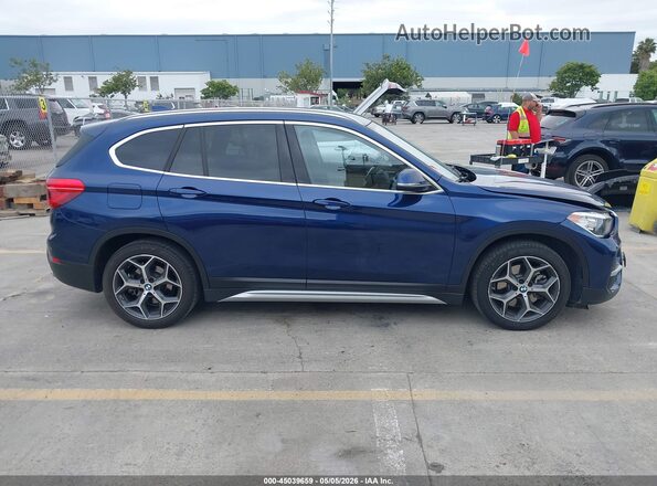 WBXHT3C39J5L33547 2018 BMW X1 Синий Вид задней части салона