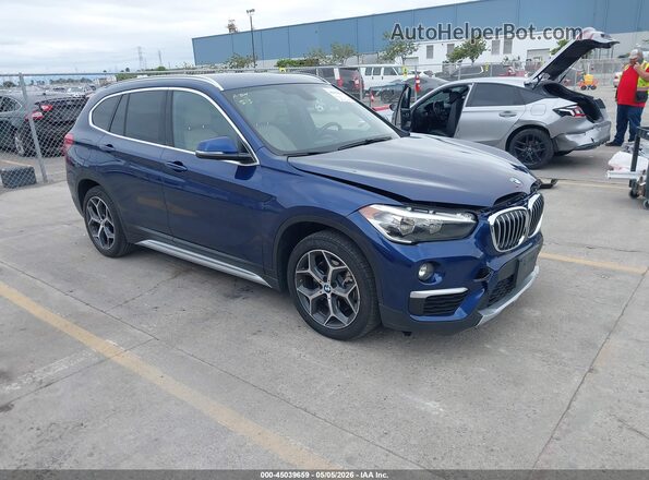 WBXHT3C39J5L33547 2018 BMW X1 Синий Передняя правая четверть