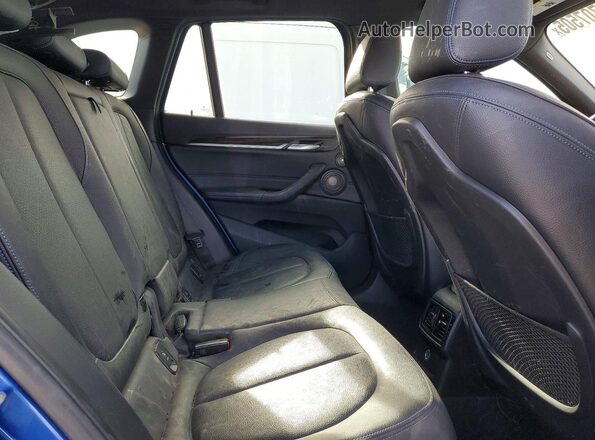WBXHT3C3XG5E47956 2016 BMW X1 Синий Вид задней части салона