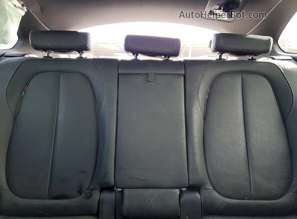 WBXHT3C3XG5E47956 2016 BMW X1 Синий Вид задних сидений
