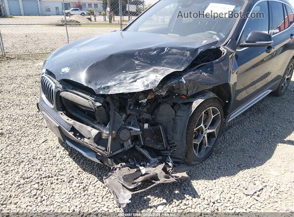 WBXHT3C55K5L89410 2019 BMW X1 Black Vista frontal