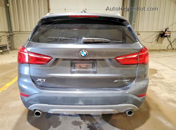 WBXHT3C59K5L90477 2019 BMW X1 Gray Вид ззаду