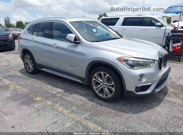 WBXHT3Z39H4A56165 2017 BMW X1 Серебряный Передняя правая четверть