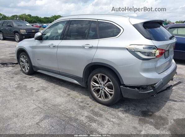 WBXHT3Z39H4A56165 2017 BMW X1 Серебряный Задняя левая четверть