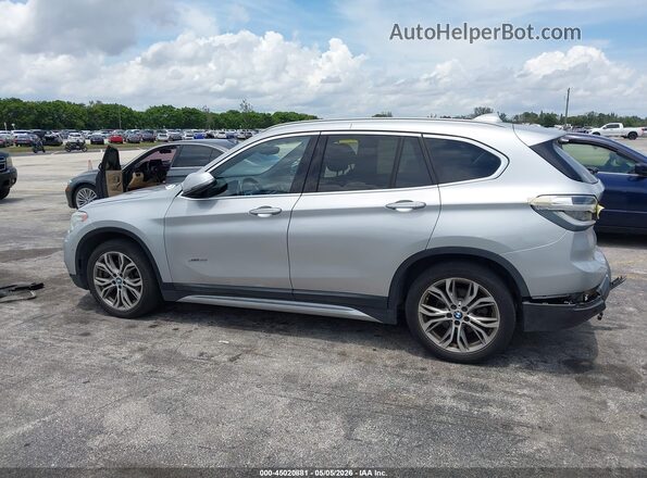 WBXHT3Z39H4A56165 2017 BMW X1 Серебряный 