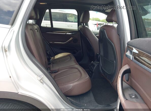 WBXHT3Z39H4A56165 2017 BMW X1 Серебряный Вид наклейки с VIN-кодом
