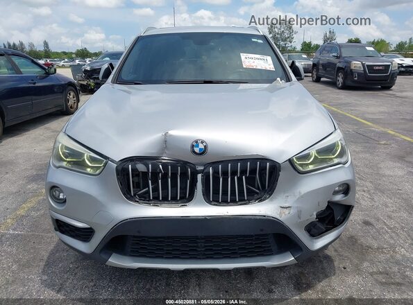 WBXHT3Z39H4A56165 2017 BMW X1 Серебряный Вид задней части салона