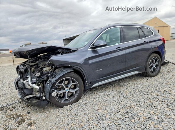 WBXHT3Z3XH4A65490 2017 BMW X1 Gray Առջևի ձախ երեք քառորդ տեսարան