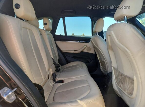WBXHU7C30H5H38374 2017 BMW X1 Черный Вид задних сидений