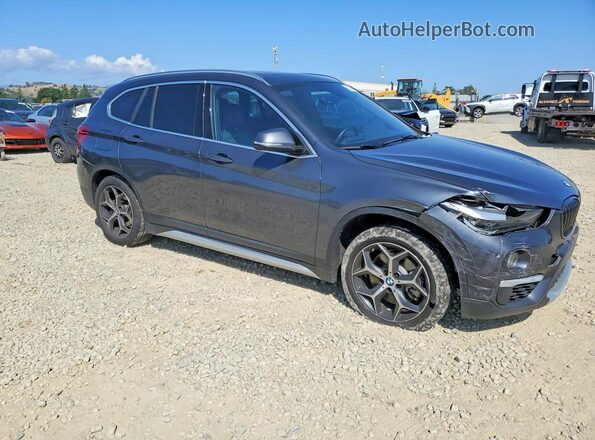 WBXHU7C37J5L09784 2018 BMW X1 Charcoal Delantero derecho