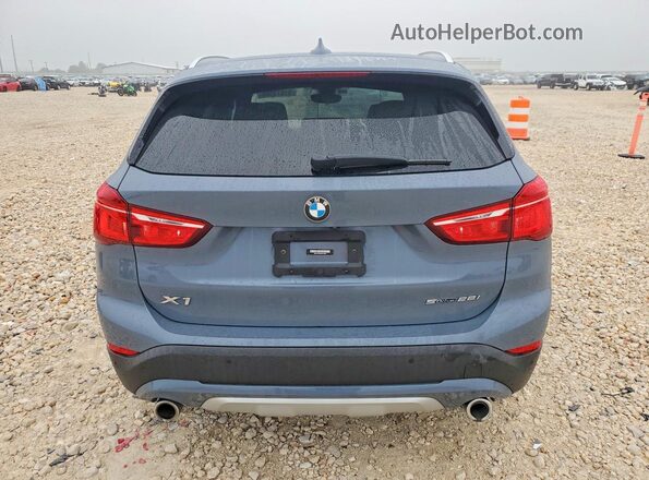 WBXJG7C00M5U33656 2021 BMW X1 Синий Вид сзади