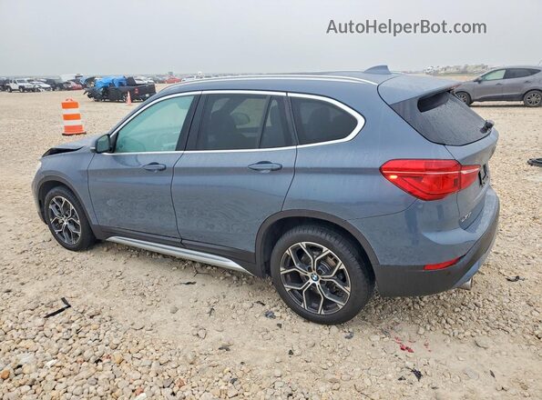 WBXJG7C00M5U33656 2021 BMW X1 Синий Задняя левая четверть