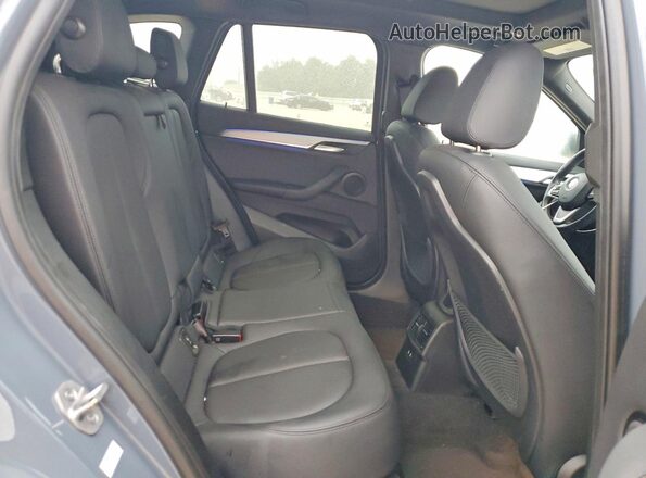 WBXJG7C00M5U33656 2021 BMW X1 Синий Вид задней части салона