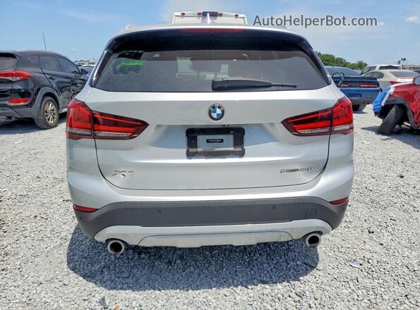 WBXJG7C01L5R26809 2020 BMW X1 Серебряный Вид сзади