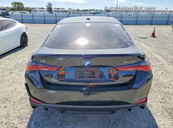 WBY23HD05SFV82748 2025 BMW I4 Угольный Вид сзади