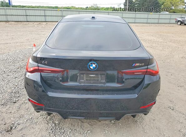 WBY33AW07PFP08317 2023 BMW I4 Black Widok z tyłu