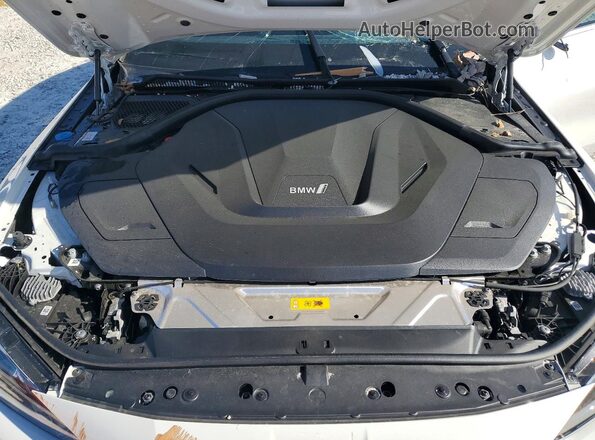 WBY43AW09PFP74985 2023 BMW I4 White Vista interior trasera
