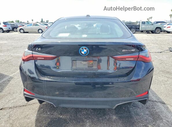 WBY73AW00PFP59577 2023 BMW I4 Black Rear view