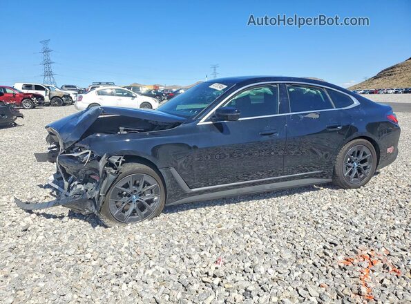 WBY73AW00RFS68705 2024 BMW I4 Black Առջևի ձախ երեք քառորդ տեսարան