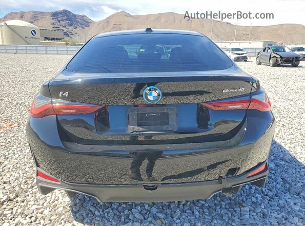 WBY73AW00RFS68705 2024 BMW I4 Black Հետևի տեսք