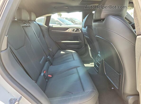 WBY73AW02RFT37099 2024 BMW I4 White Vista de los asientos traseros