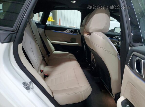 WBY83FB07RFS48104 2024 BMW I4 White Vista de los asientos traseros