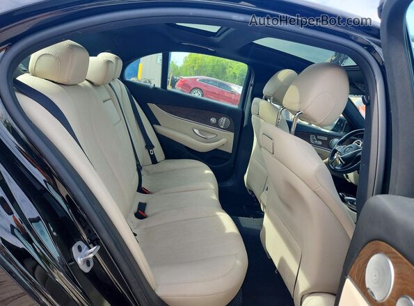 WDDZF4KBXJA467584 2018 MERCEDES-BENZ E Black Rear seats view