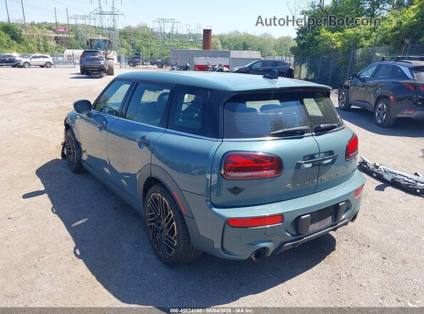 WMWJZ9C06P2T00910 2023 MINI CLUBMAN Blue Trasero izquierdo