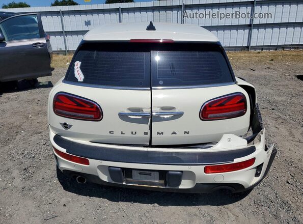 WMWXJ1C08L2L33985 2020 MINI COOPER Бежевый Вид сзади