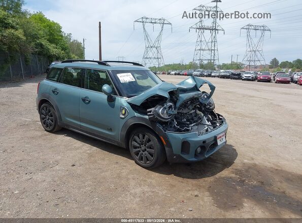 WMZ23BS09P3R69118 2023 MINI SE COUNTRYMAN Бирюзовый Передняя правая четверть