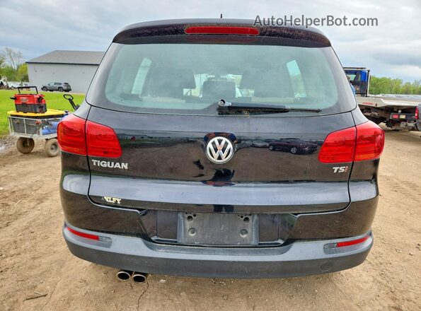 WVGAV7AX2GW582759 2016 VOLKSWAGEN TIGUAN Black Widok z tyłu