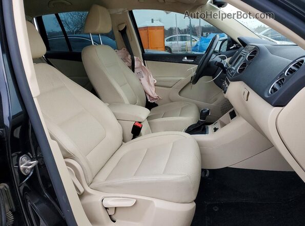 WVGAV7AX6GW597278 2016 VOLKSWAGEN TIGUAN Черный Вид салона спереди