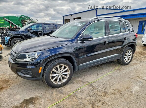 WVGSV7AX0HK010554 2017 VOLKSWAGEN TIGUAN Black Vista tres cuartos delantera izquierda