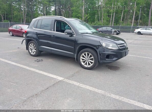 WVGSV7AX0HW508908 2017 VOLKSWAGEN TIGUAN Black Przód prawy