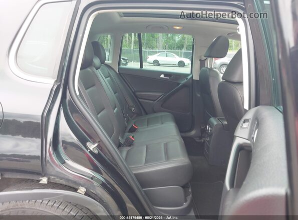 WVGSV7AX0HW508908 2017 VOLKSWAGEN TIGUAN Black Widok naklejki z numerem VIN