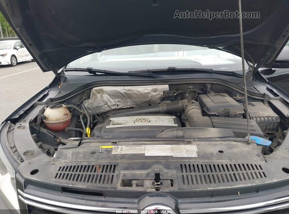 WVGSV7AX0HW508908 2017 VOLKSWAGEN TIGUAN Black Widok z tyłu