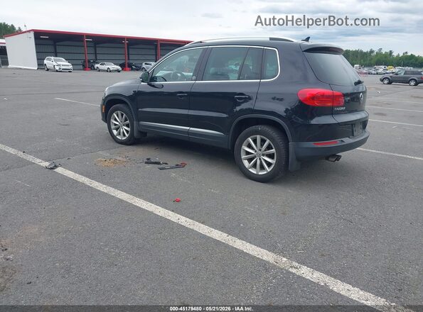 WVGSV7AX0HW508908 2017 VOLKSWAGEN TIGUAN Black Tył lewy